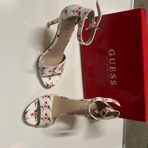 Guess white heels with pink floral details in size 5.5
